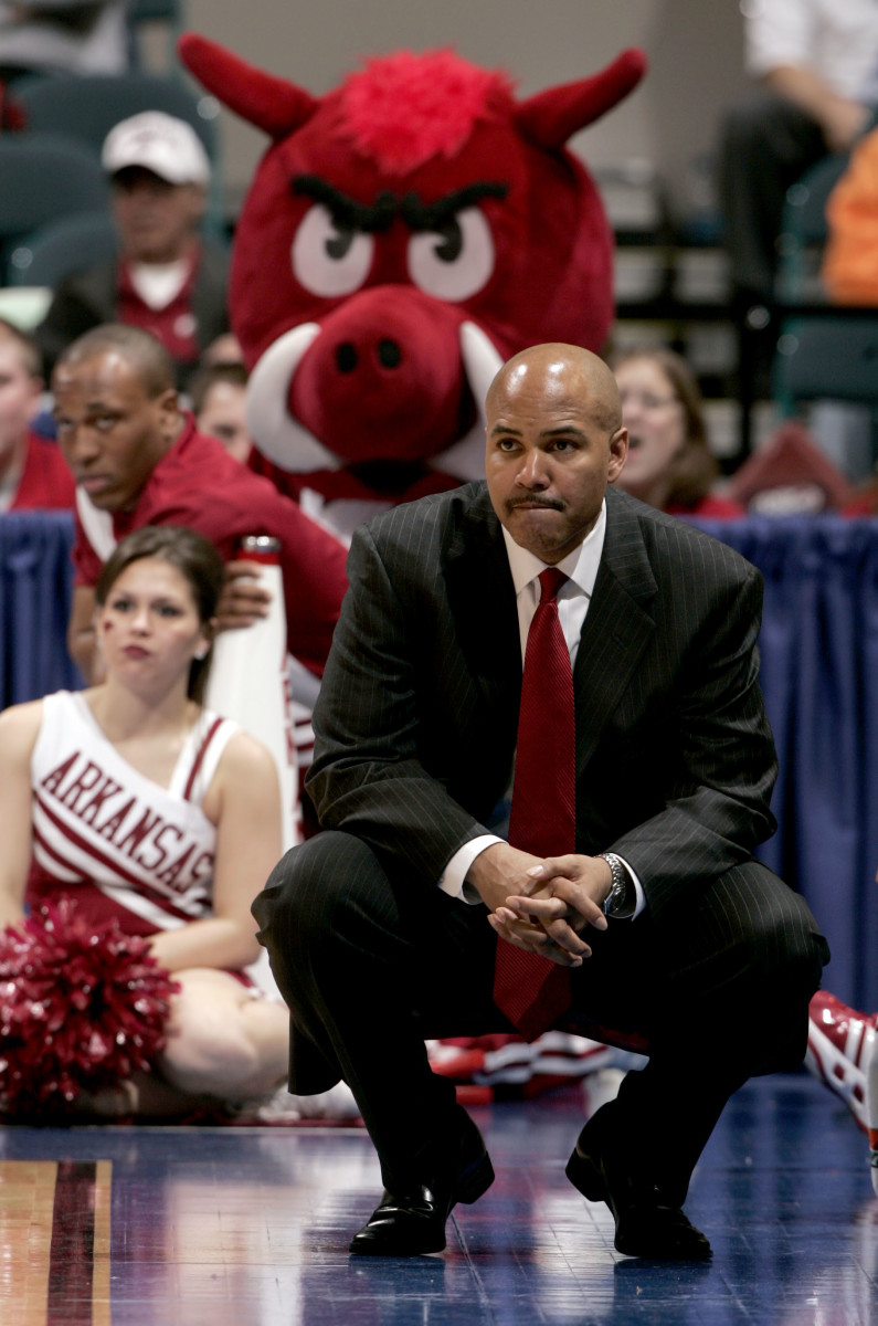Arkansas Razorbacks head coach Stan Heath watches from the sidelines during the second half of a quarterfinal round SEC Tournament game against the Vanderbilt Commodores at the Georgia Dome in Atlanta.